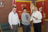 Bray McComb presented with Law Day prize by principal Ben Donovan and Keeewaytinok board member Tina Allen